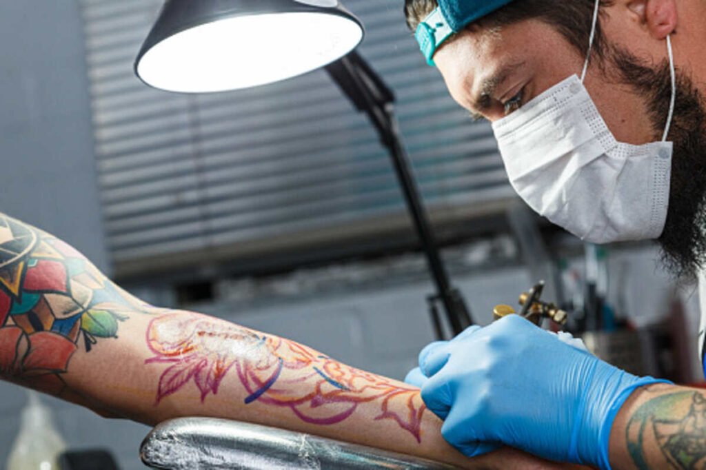 mandala hand tattoo